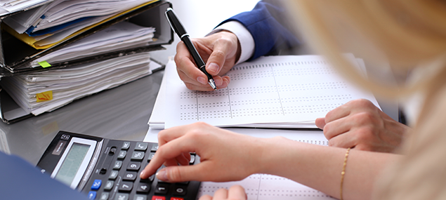 Bookkeeper Or Financial Inspector And Secretary Making Report, Calculating Or Checking Balance. Audit Concept.