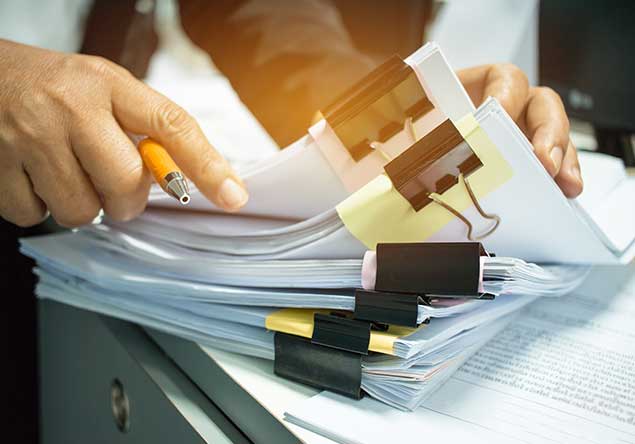 Businesswoman Hands Working On Stacks Of Documents Files For Finance In Office